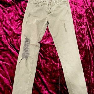 FunJust Black sz26 Skinny Leg in army green. Intentional rips right & left legs